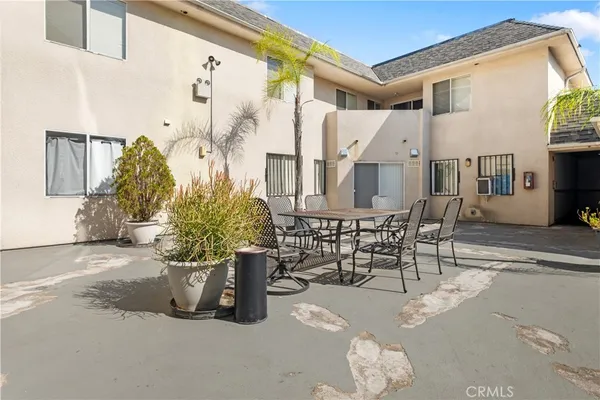 a view of parking area with parked car