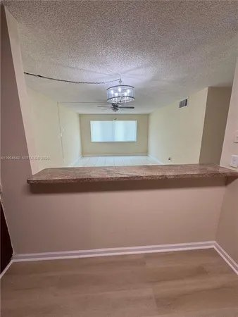 a view of a livingroom with a window
