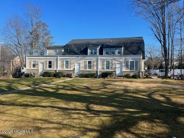 a swimming pool view with a outdoor seating