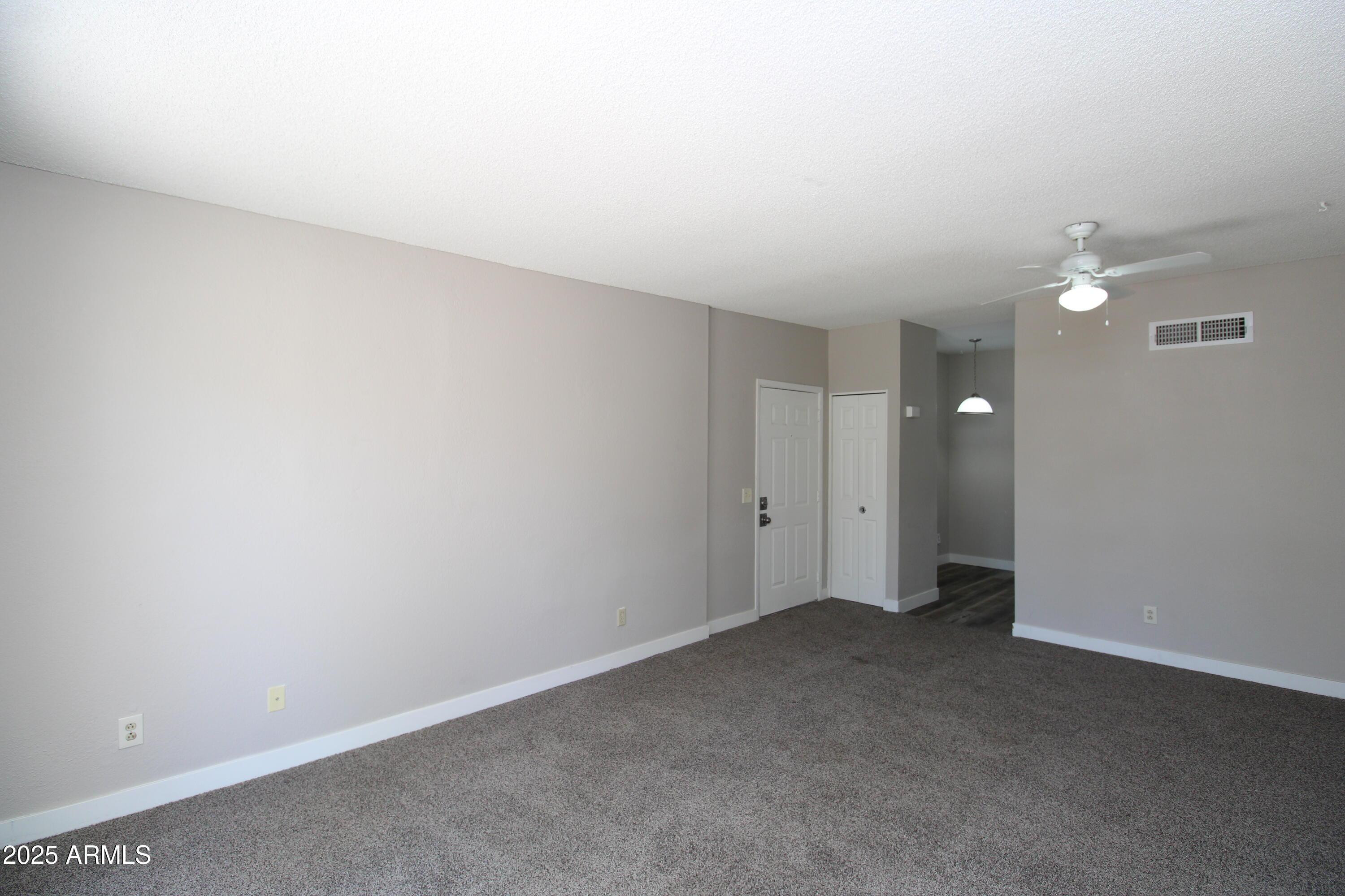 2807 East Paradise Lane, Unit 102 Phoenix, AZ 85032 - Photo 8 of 12 a view of an empty room