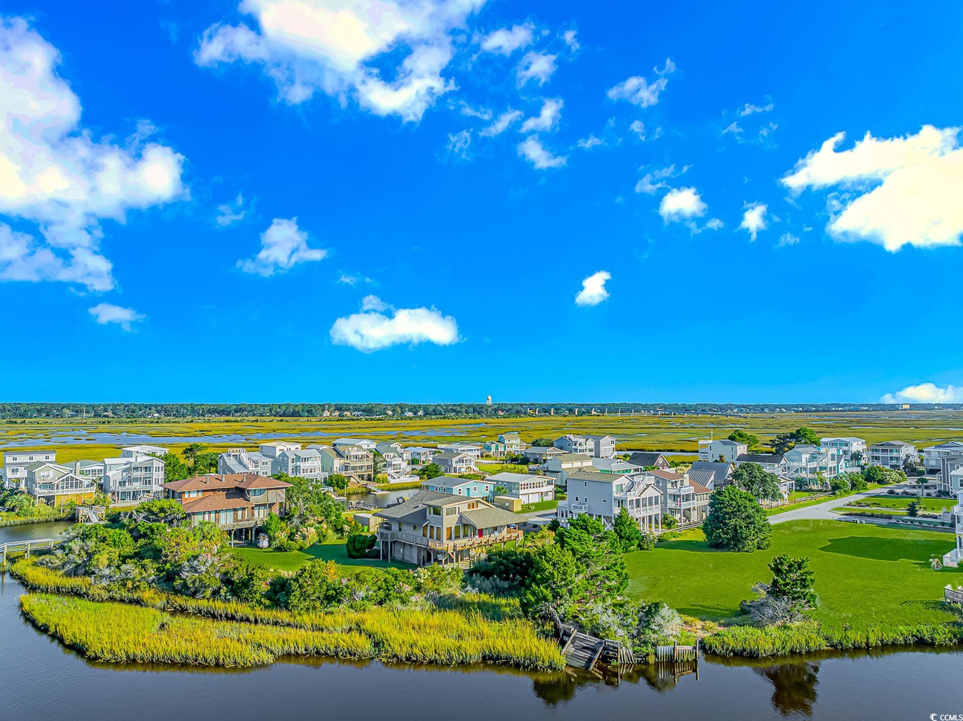 1417 Inlet Street Sunset Beach, NC 28468 - Photo 11 of 36 Drone / aerial view with a water view