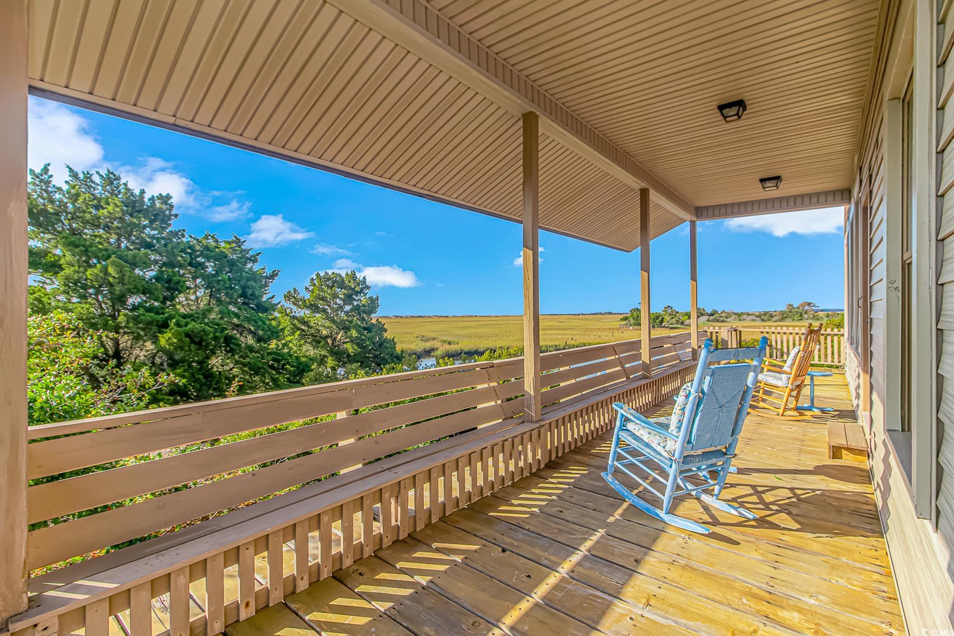 1417 Inlet Street Sunset Beach, NC 28468 - Photo 12 of 36 View of wooden terrace