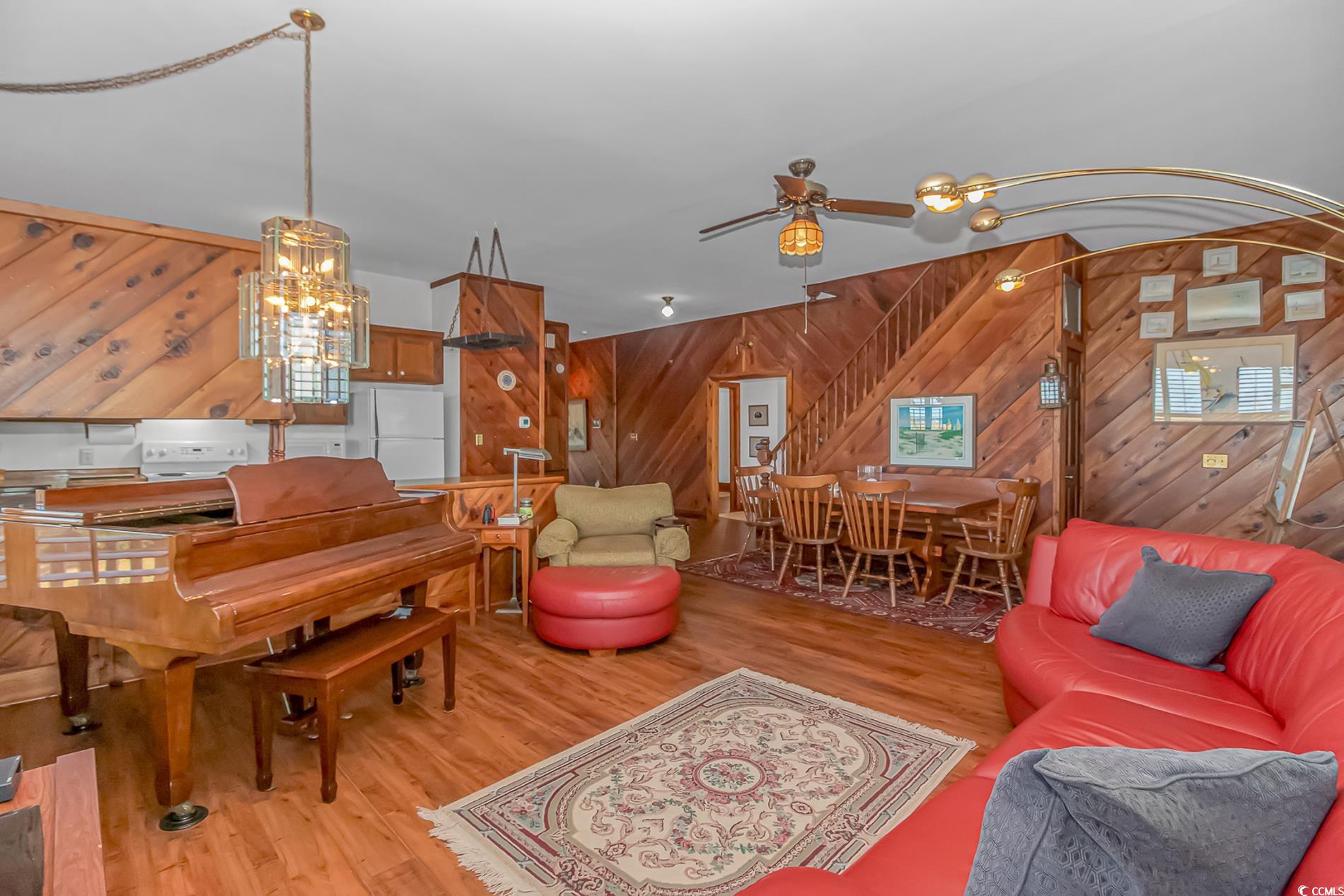 1417 Inlet Street Sunset Beach, NC 28468 - Photo 16 of 36 Living room featuring light wood-type flooring, wo