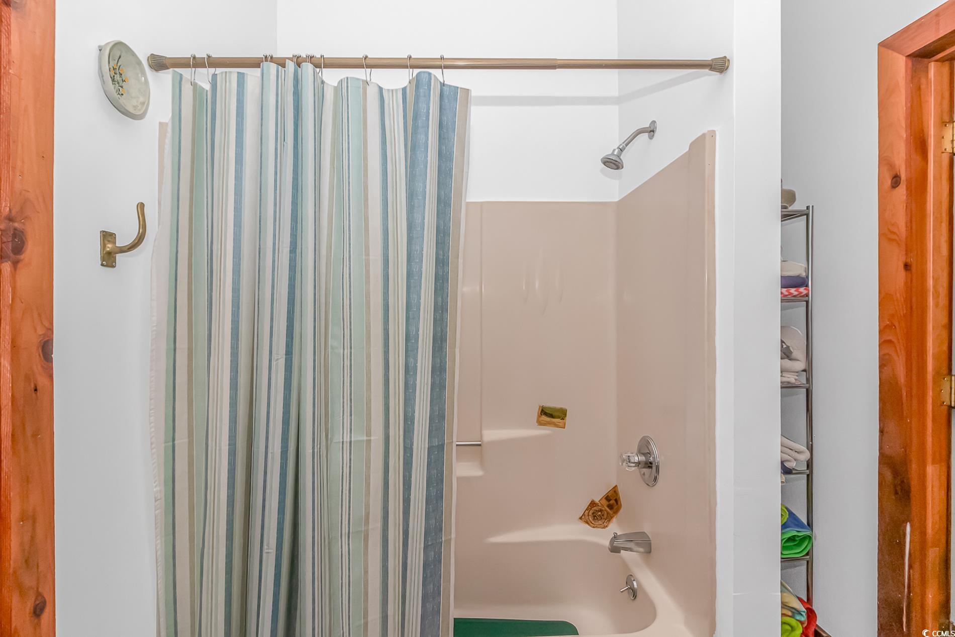 1417 Inlet Street Sunset Beach, NC 28468 - Photo 20 of 36 Bathroom featuring shower / bath combo