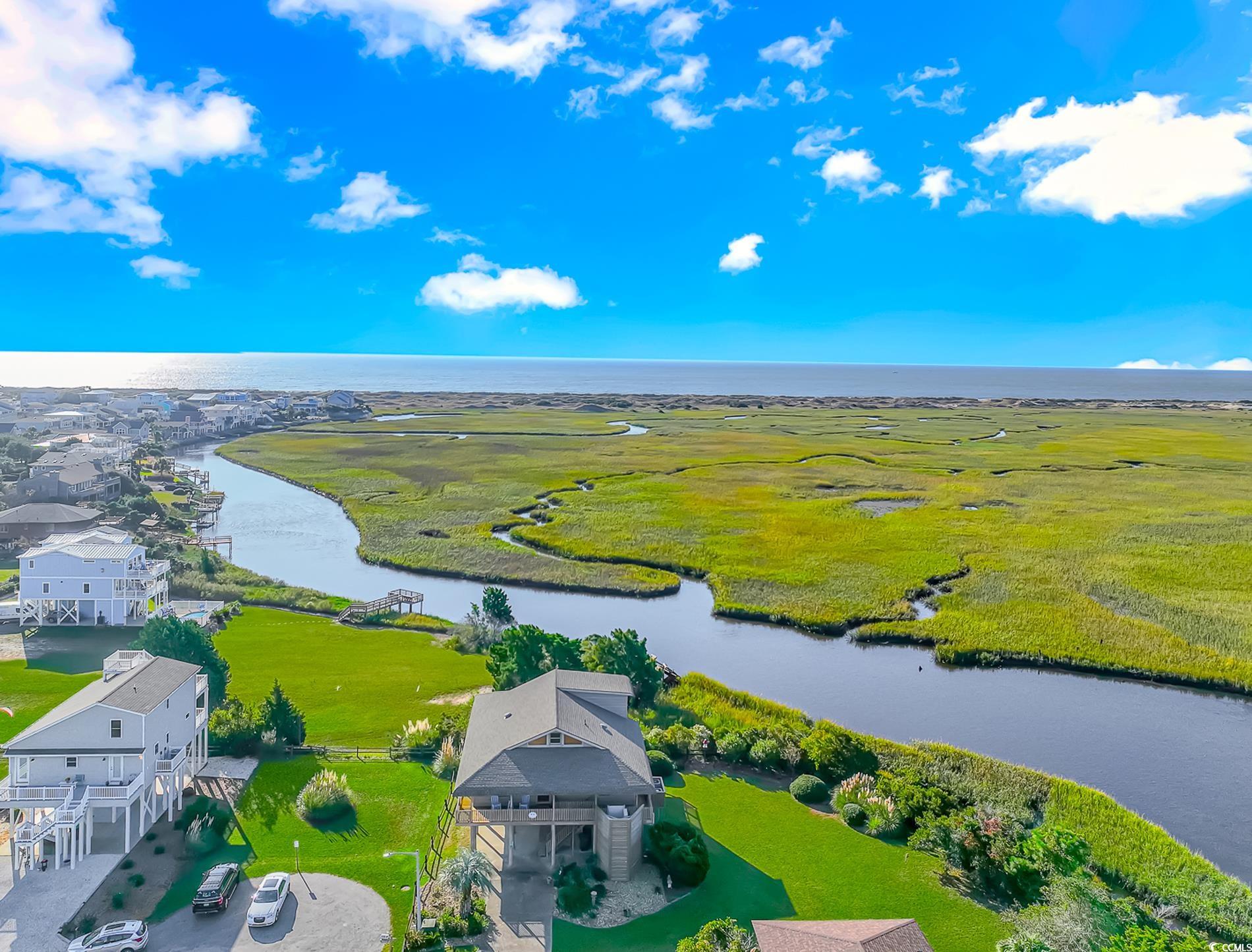 1417 Inlet Street Sunset Beach, NC 28468 - Photo 3 of 36 Drone / aerial view with a rural view and a water