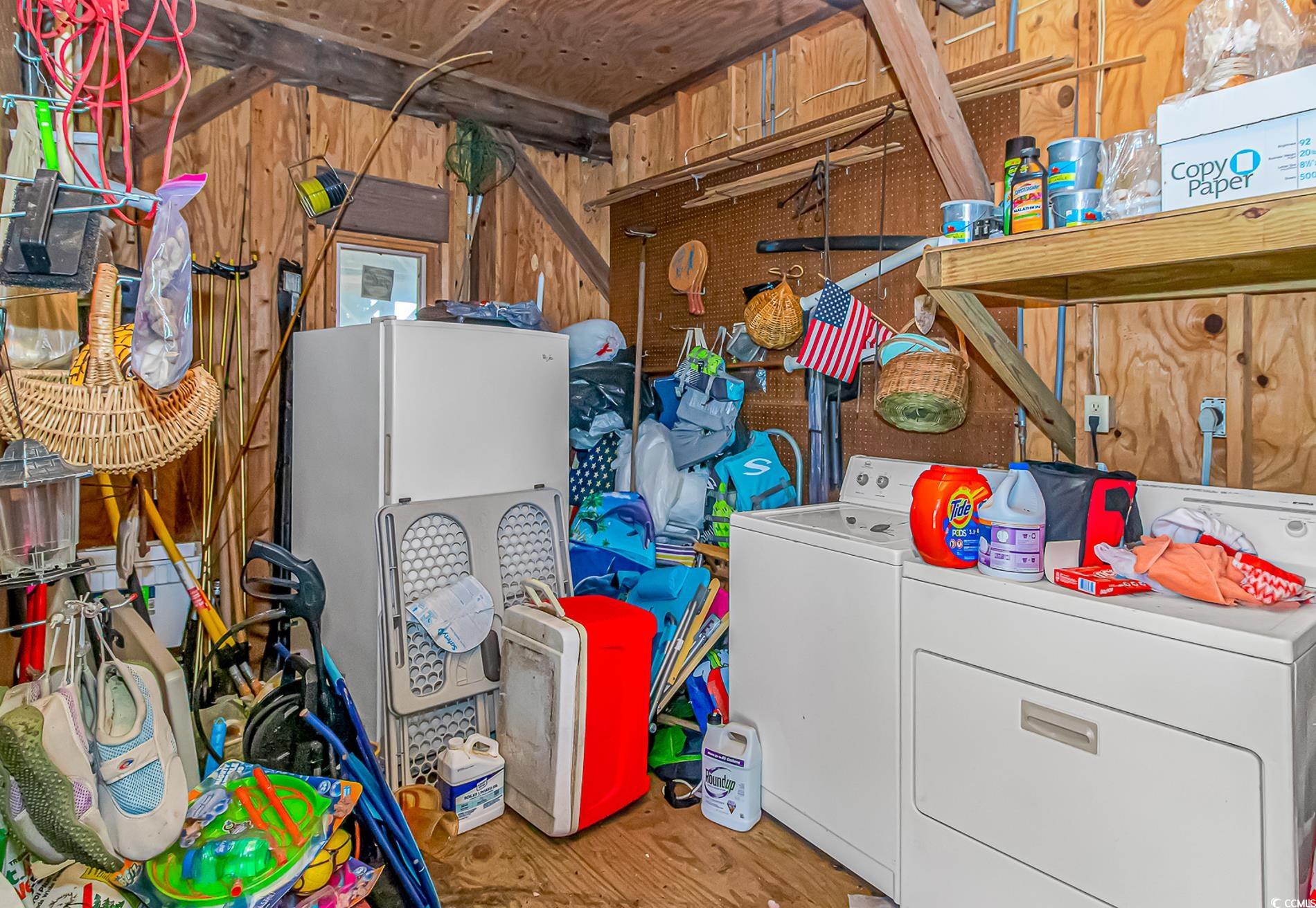 1417 Inlet Street Sunset Beach, NC 28468 - Photo 33 of 36 Clothes washing area with hardwood / wood-style fl