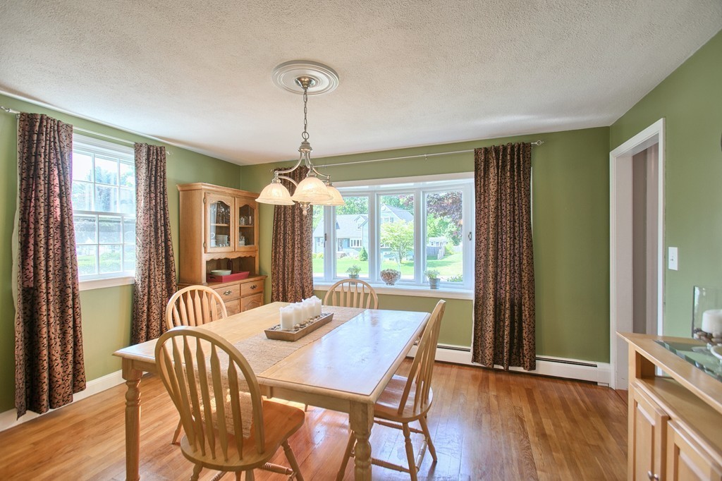 46 Charme Road Billerica, MA 01821 - Photo 14 of 30 a view of a dining room with furniture window and wooden floor