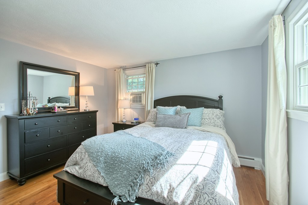 46 Charme Road Billerica, MA 01821 - Photo 26 of 30 a bedroom with a bed and a dresser