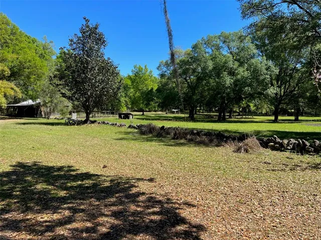 a view of a lake from a yard