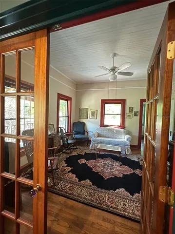 a view of a dining room with furniture window and outside view