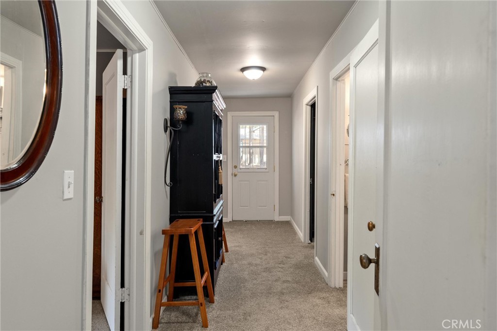 7554 Humboldt Road Butte Meadows, CA 95942 - Photo 12 of 41 a view of a hallway with furniture and closet