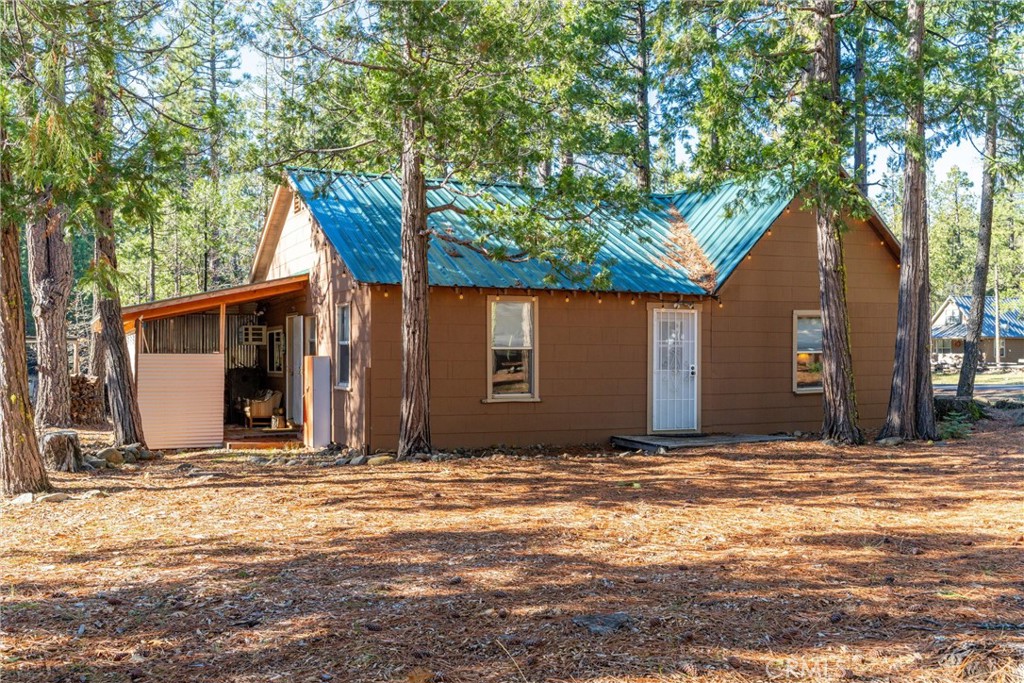7554 Humboldt Road Butte Meadows, CA 95942 - Photo 19 of 41 a view of house with tree in front of it