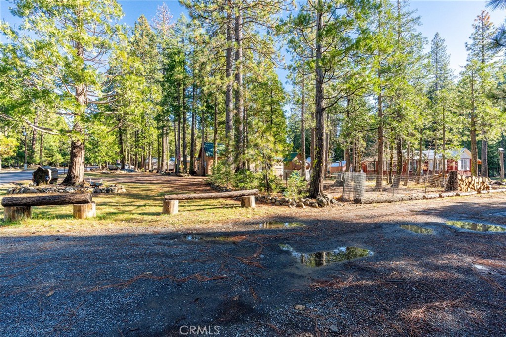 7554 Humboldt Road Butte Meadows, CA 95942 - Photo 22 of 41 a view of a swimming pool with an outdoor space