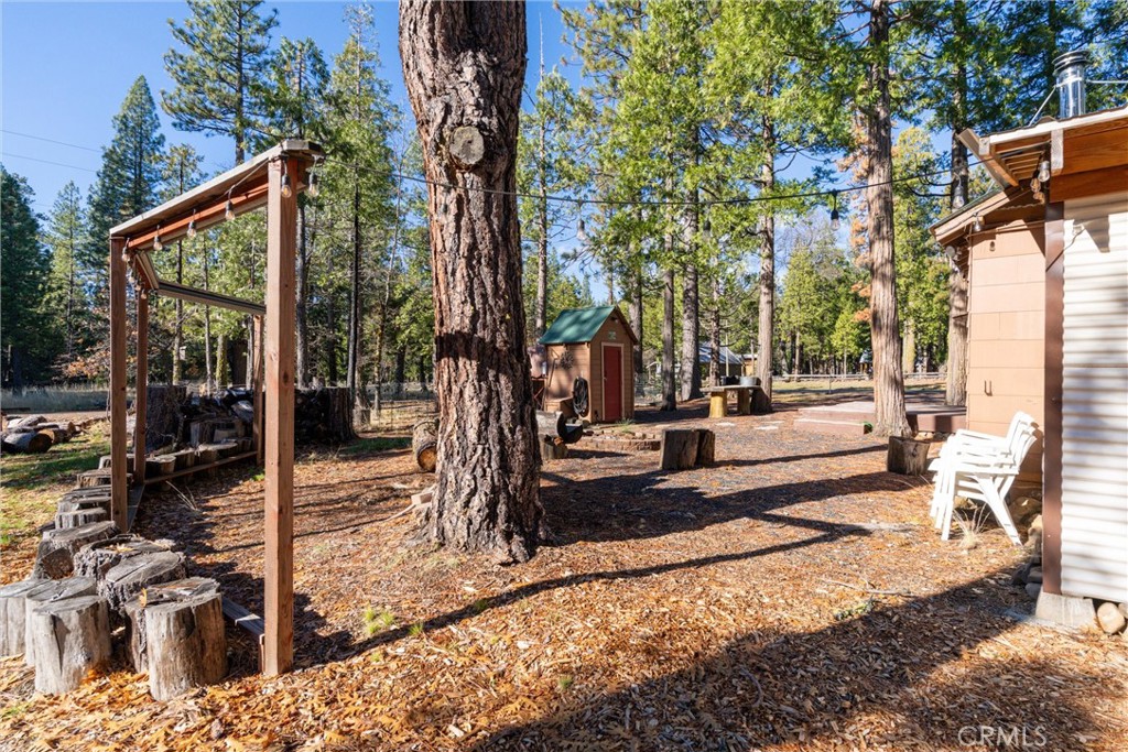 7554 Humboldt Road Butte Meadows, CA 95942 - Photo 29 of 41 a view of a backyard with sitting area