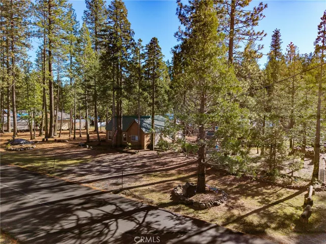 a view of street along with trees