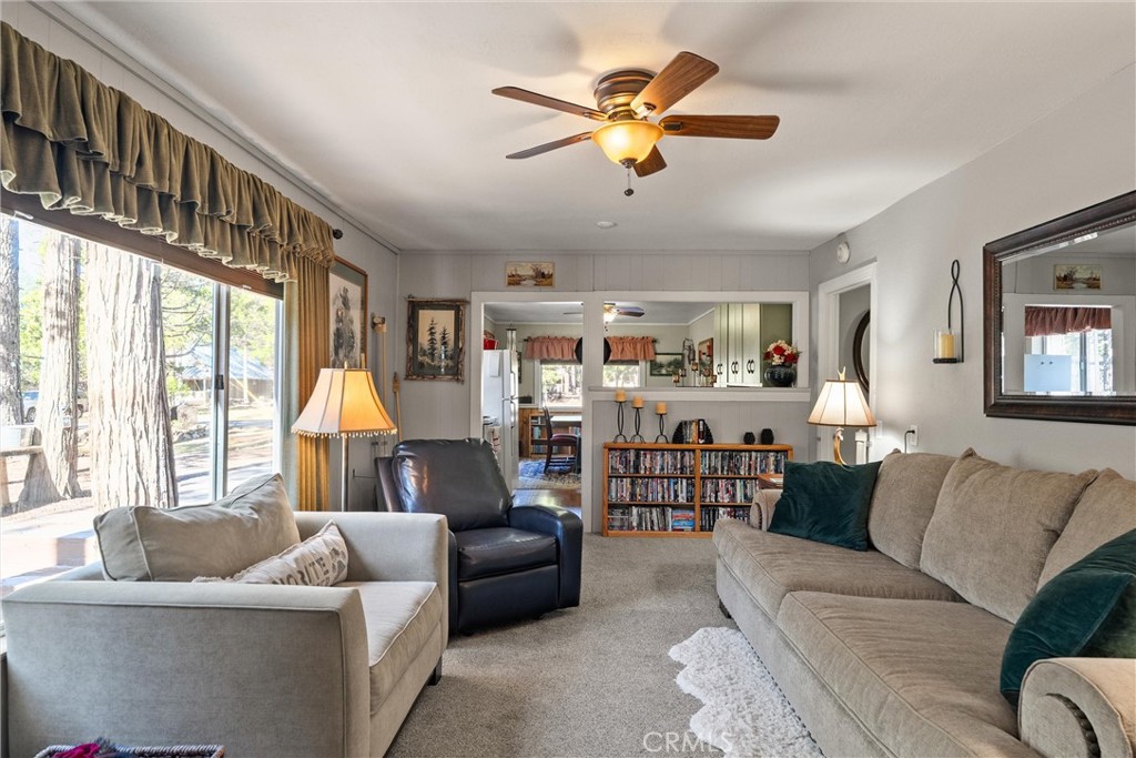 7554 Humboldt Road Butte Meadows, CA 95942 - Photo 5 of 41 a living room with furniture and a large window