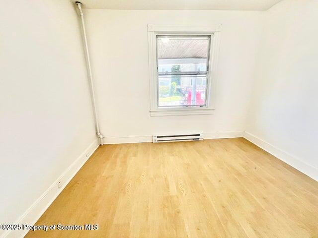 2036 Rigg Street, Unit A Dunmore, PA 18512 - Photo 5 of 8 a view of a room with an empty space