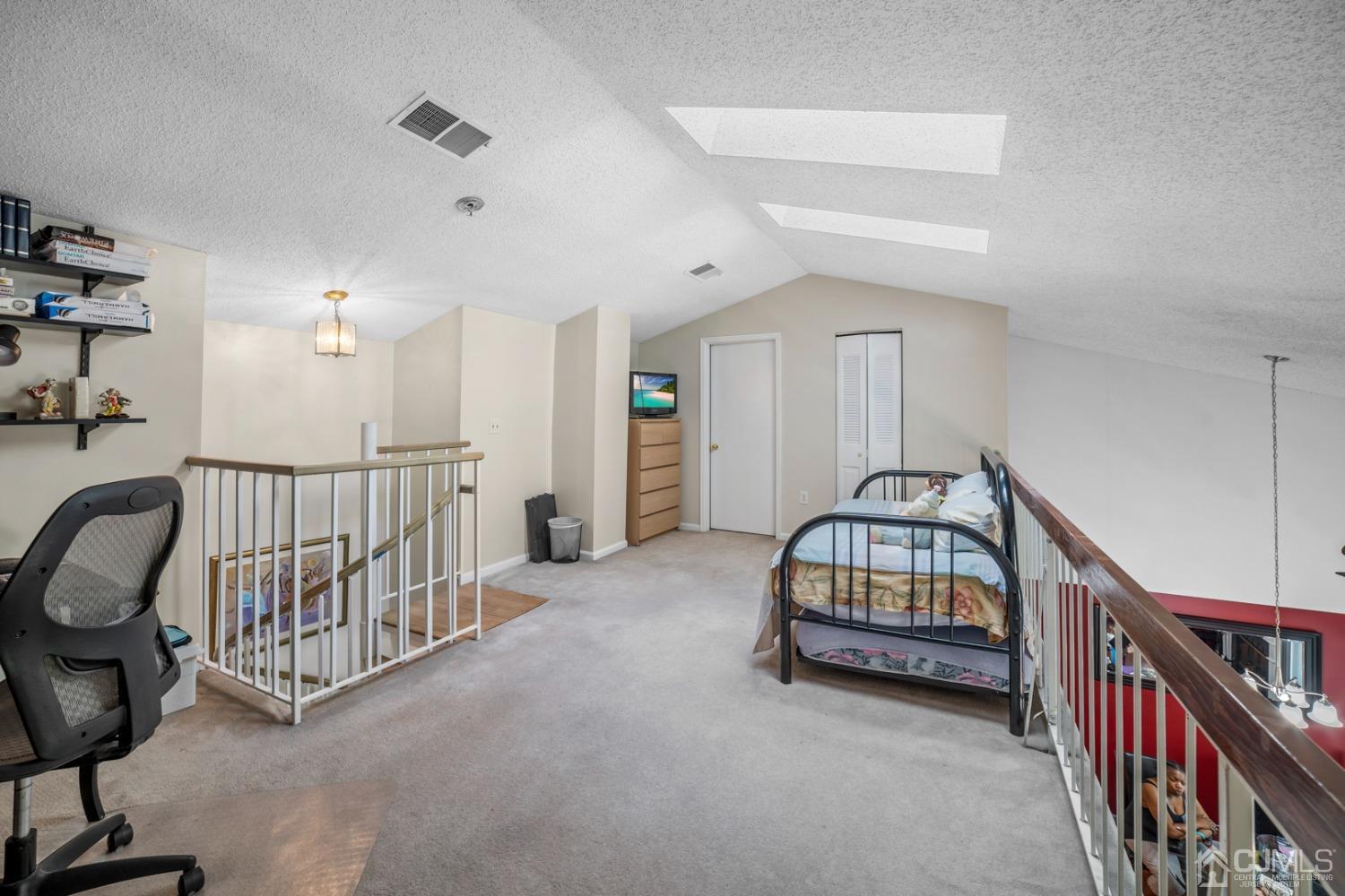 133 Edpas Road New Brunswick, NJ 08901 - Photo 16 of 17 a bedroom with furniture and a window