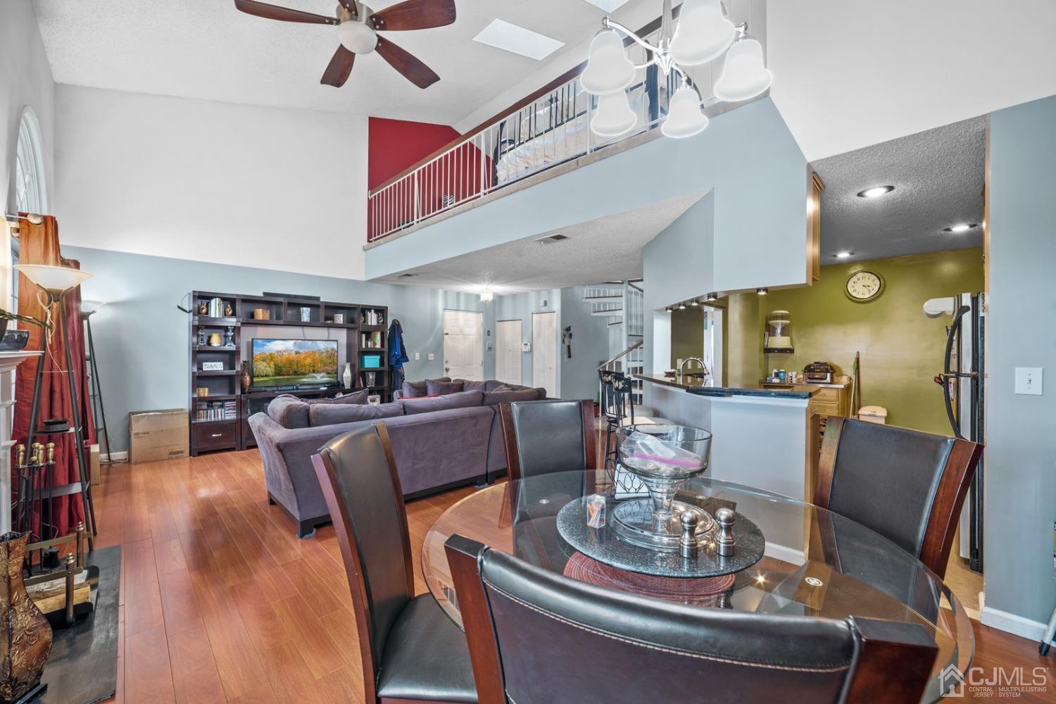133 Edpas Road New Brunswick, NJ 08901 - Photo 6 of 17 a living room with furniture and a flat screen tv