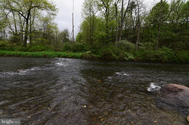 a view of a lake with houses