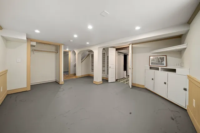 a view of a livingroom with white walls