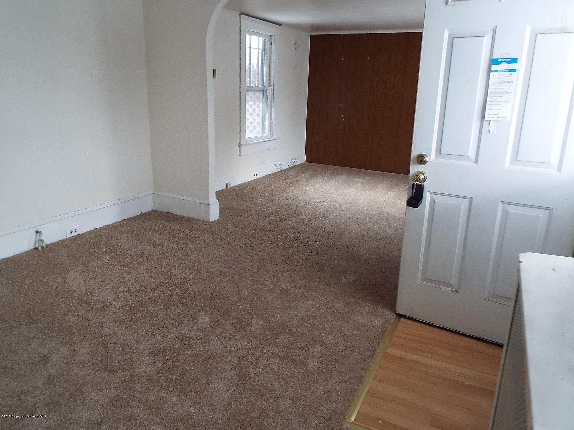 24 Rutz Street Ashley, PA 18706 - Photo 6 of 13 an empty room with windows