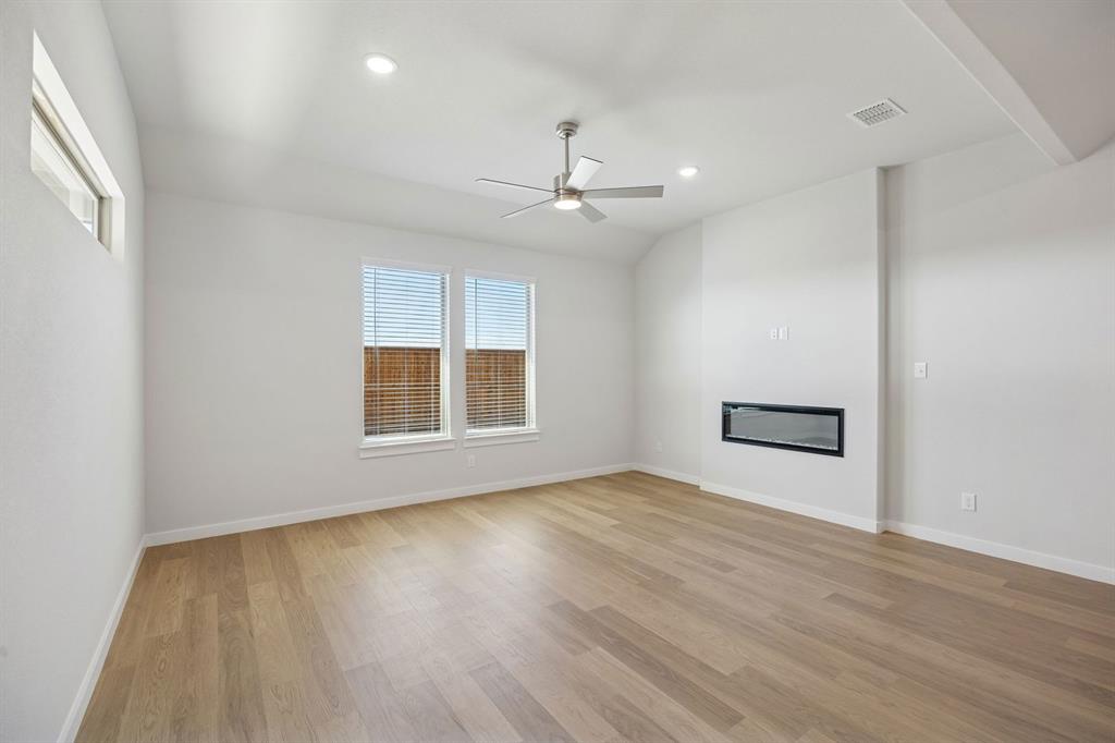 2102 Sunshining Road Princeton, TX 75407 - Photo 11 of 38 Living Room in the Wimbledon home plan by Trophy Signature Homes – REPRESENTATIVE PHOTO