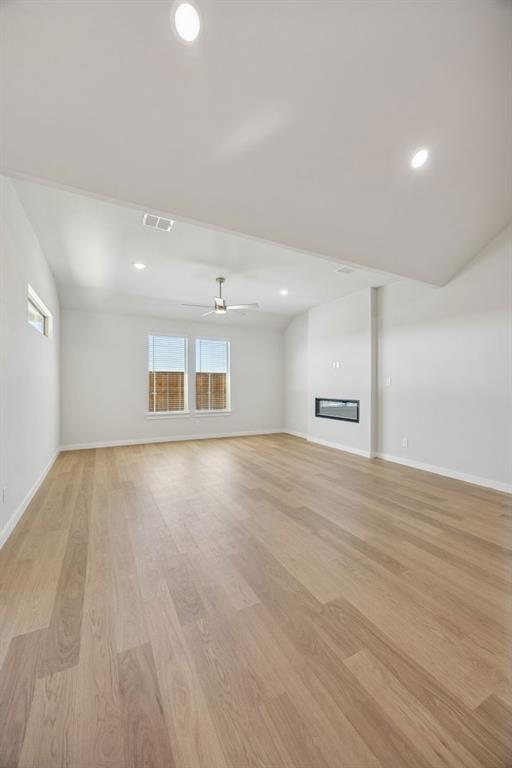 2102 Sunshining Road Princeton, TX 75407 - Photo 12 of 38 Living Room in the Wimbledon home plan by Trophy Signature Homes – REPRESENTATIVE PHOTO