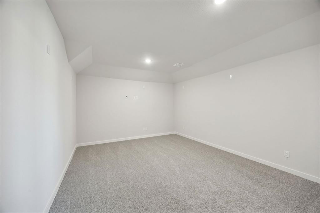 2102 Sunshining Road Princeton, TX 75407 - Photo 25 of 38 Media Room in the Wimbledon home plan by Trophy Signature Homes – REPRESENTATIVE PHOTO