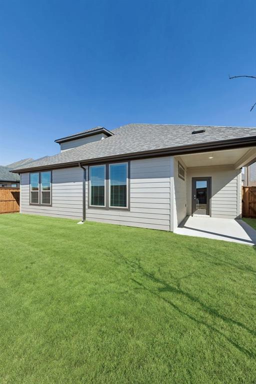 2102 Sunshining Road Princeton, TX 75407 - Photo 35 of 38 Covered Patio in the Wimbledon home plan by Trophy Signature Homes – REPRESENTATIVE PHOTO