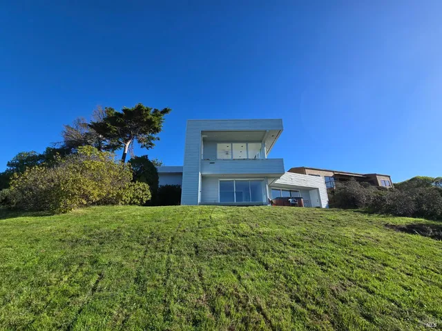 a bathroom with a double vanity sink mirror and
