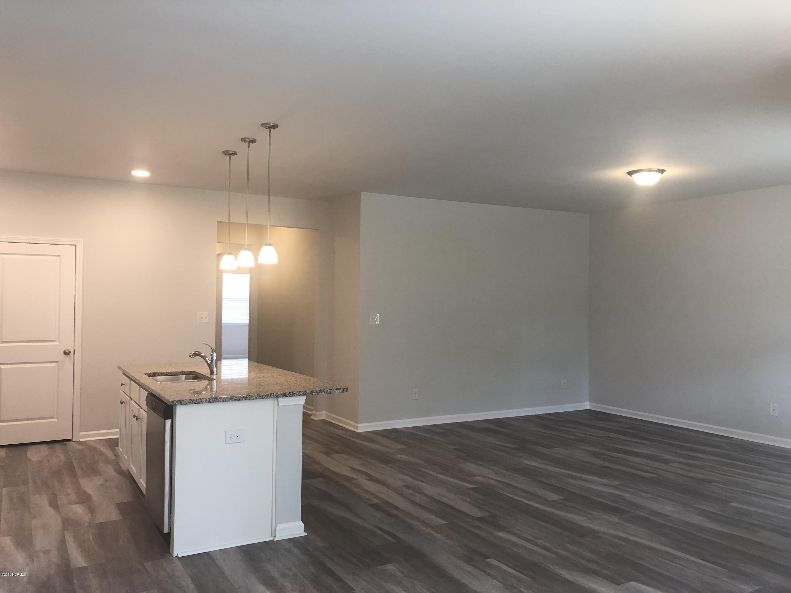 705 Morris Landing Road, Unit 155 Holly Ridge, NC 28445 - Photo 5 of 26 IMG_9823