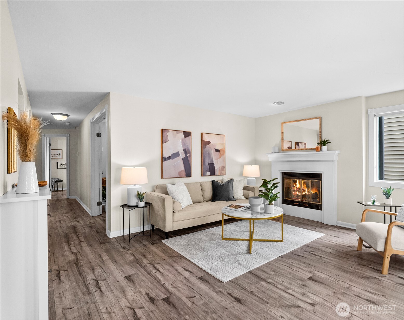 8720 Phinney Avenue North, Unit 11 Seattle, WA 98103 - Photo 6 of 28 a living room with furniture and a fireplace