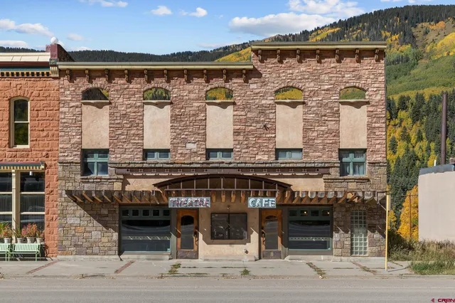 a front view of a building with glass windows