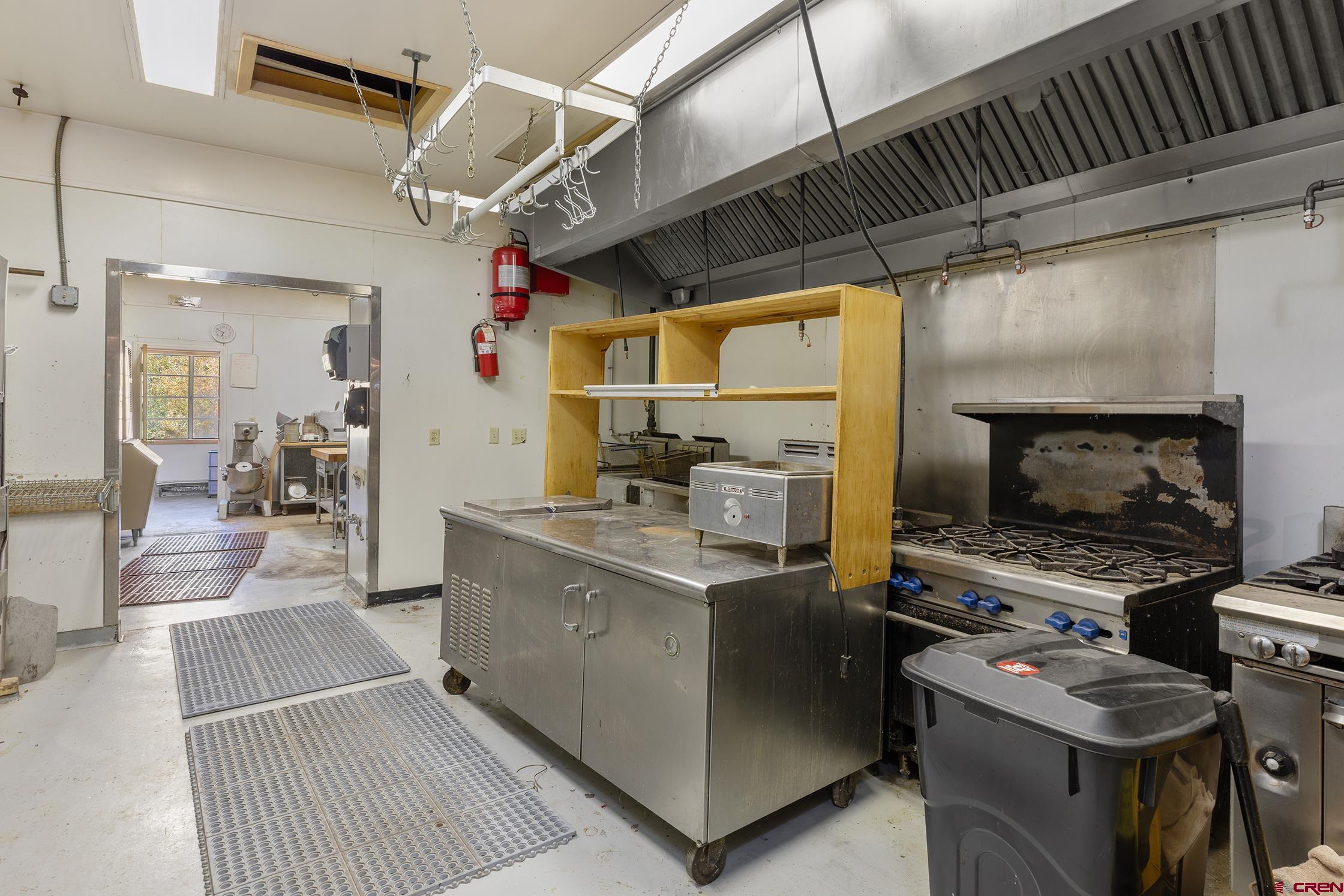 5 South Glasgow Avenue Rico, CO 81332 - Photo 13 of 21 a kitchen with a stove a refrigerator and a sink