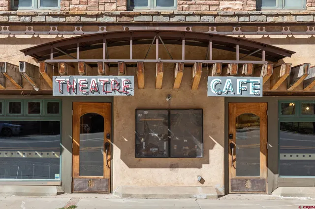 a view of a chairs and tables in the patio