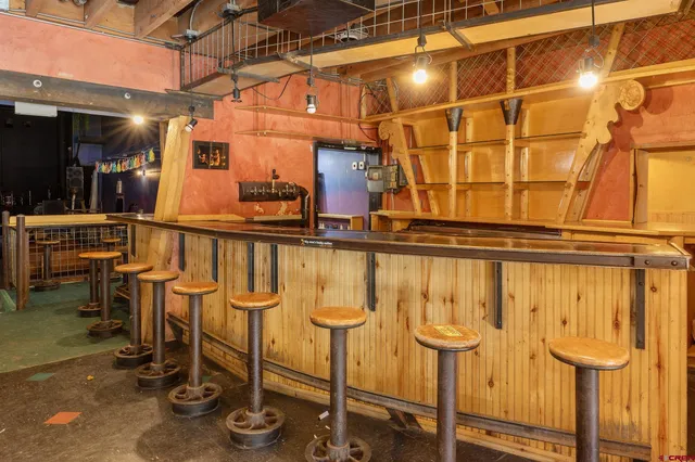 a view of a balcony with chairs