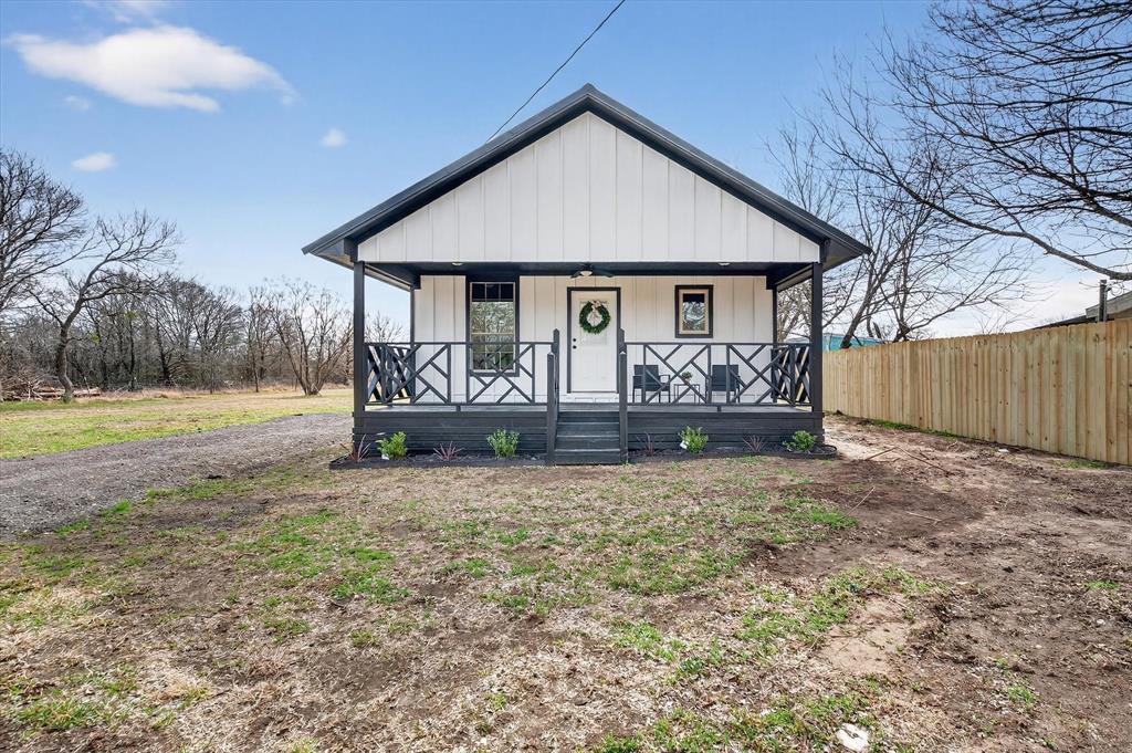 705 South 3rd Street East Dawson, TX 76639 - Photo 22 of 25 a front view of a house with garden