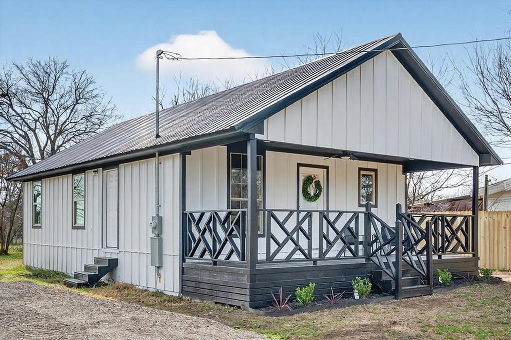 705 South 3rd Street East Dawson, TX 76639 - Photo 23 of 25 a front view of a house with garage