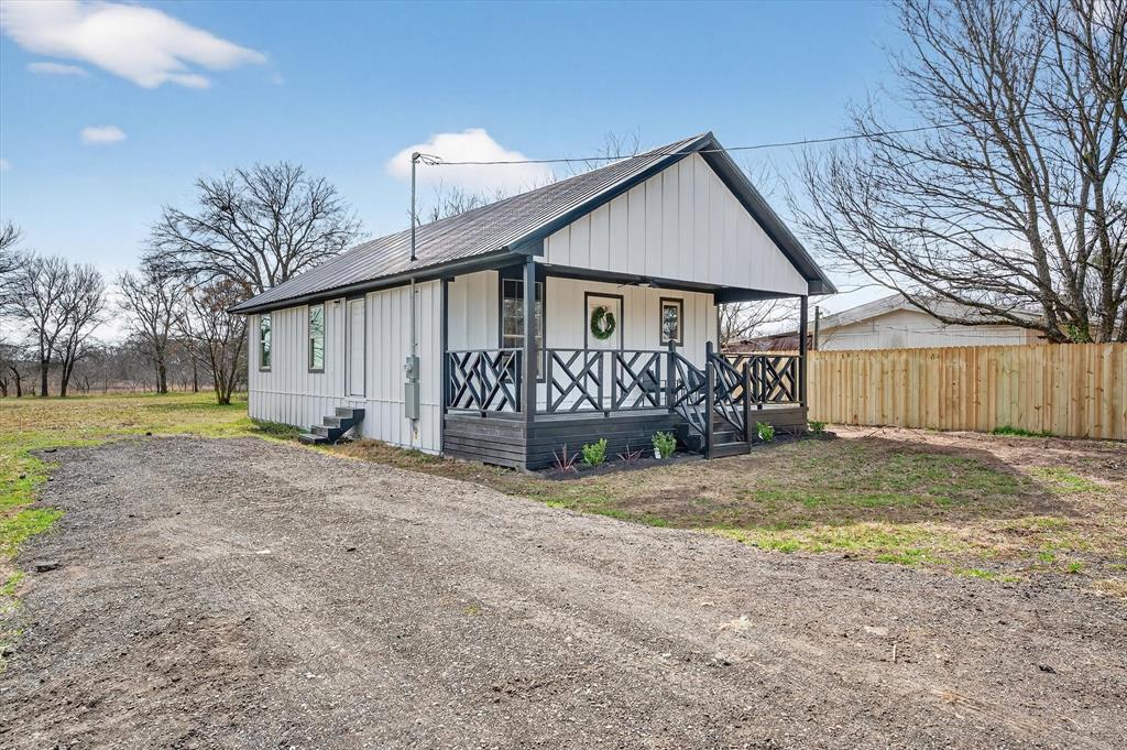 705 South 3rd Street East Dawson, TX 76639 - Photo 24 of 25 a view of a house with a yard and garage