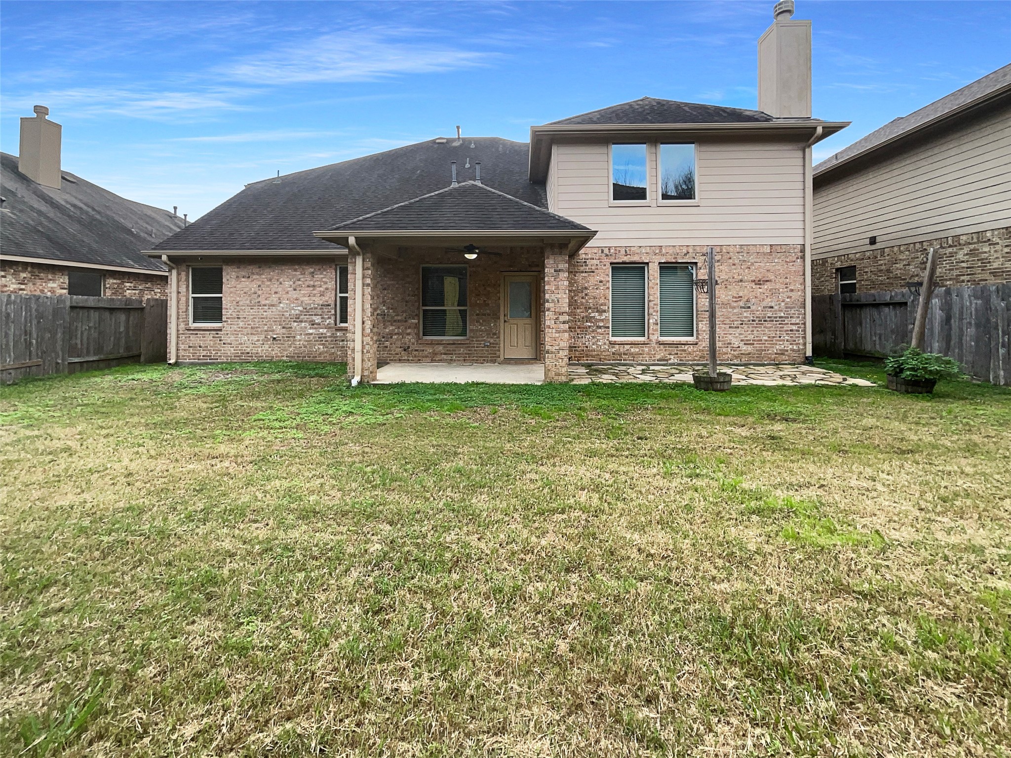 24542 North Denham Ridge Lane Spring, TX 77389 - Photo 5 of 26 a front view of a house with a garden