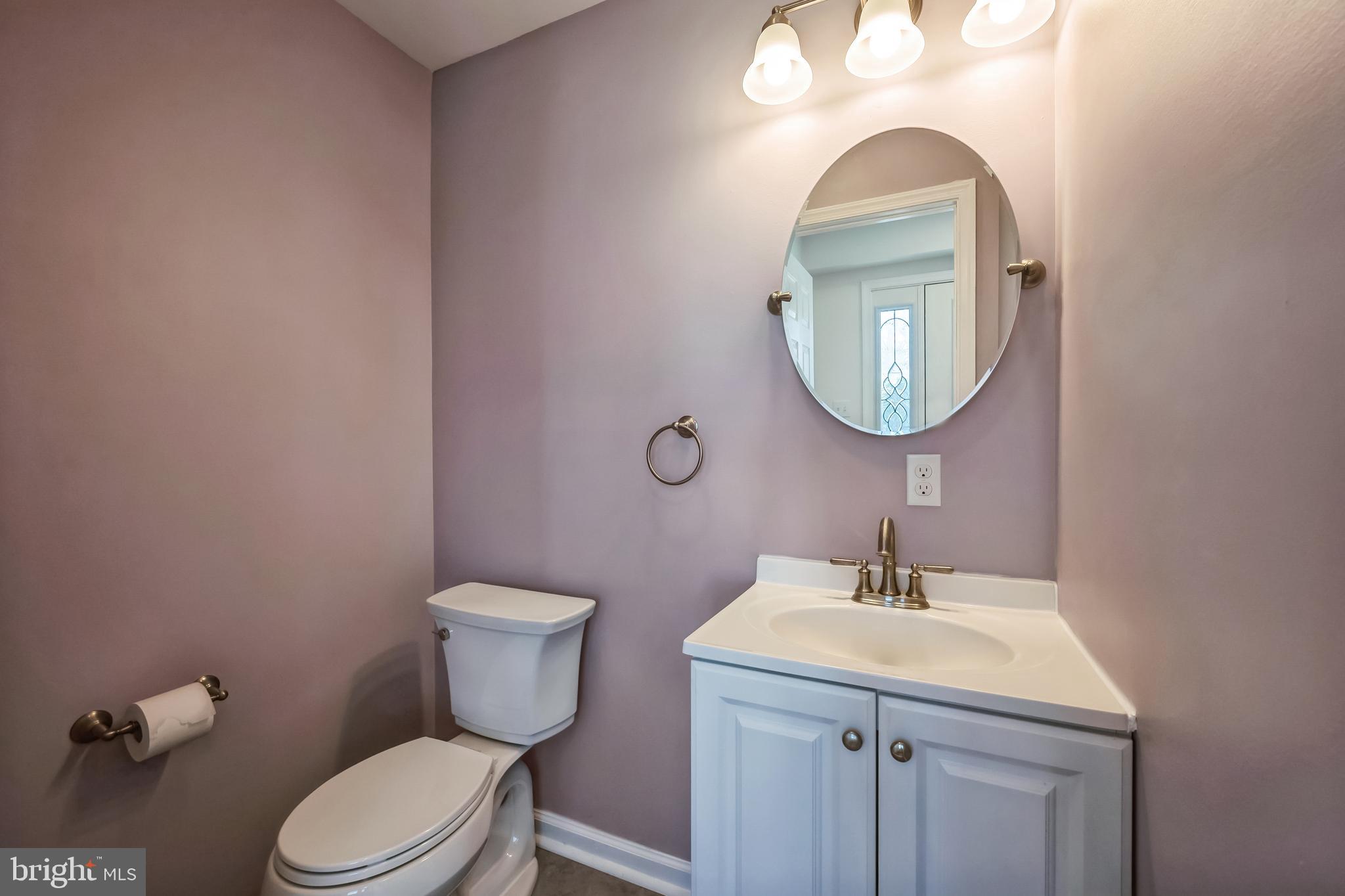 5 River Lane Levittown, PA 19055 - Photo 11 of 35 a bathroom with a toilet sink and mirror