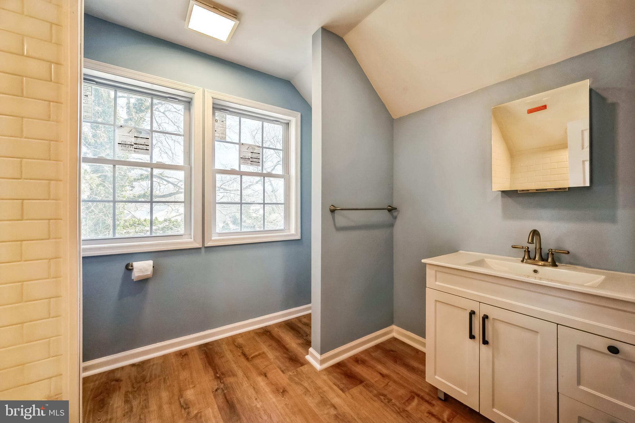 5 River Lane Levittown, PA 19055 - Photo 14 of 35 a bathroom with a sink vanity and a window
