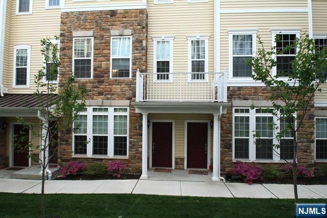 22 Clover Lane Garfield, NJ 07026 - Photo 13 of 17 a view of windows in front of a building