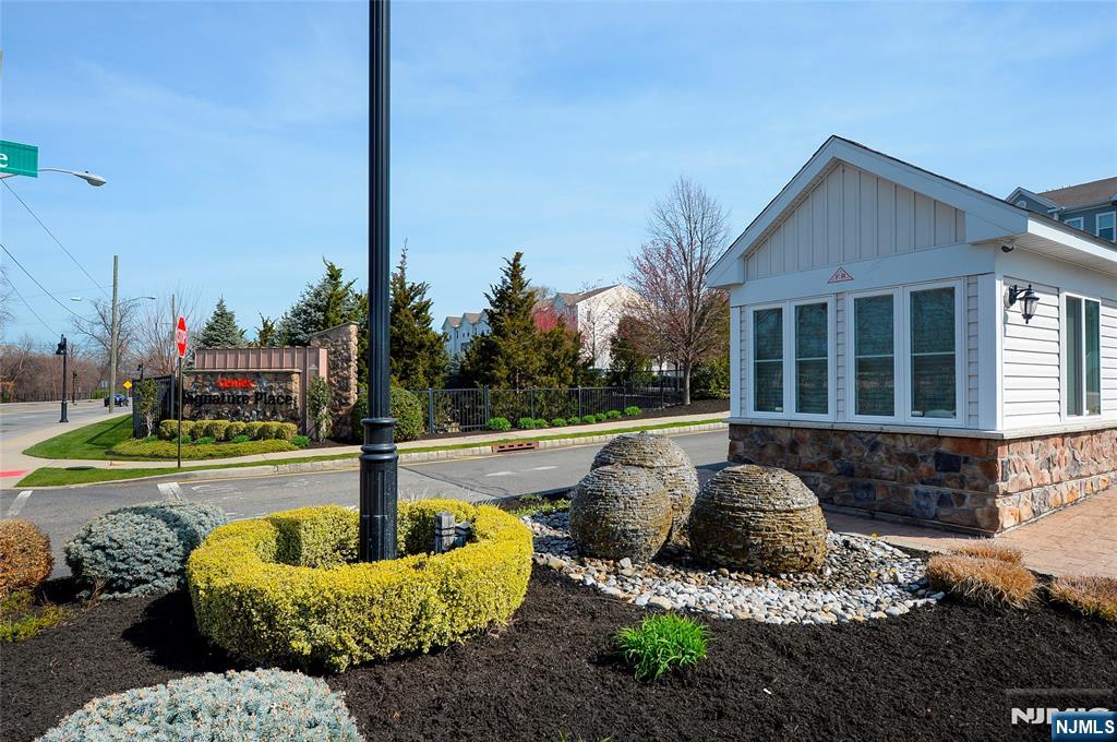 22 Clover Lane Garfield, NJ 07026 - Photo 16 of 17 a front view of a house with swimming pool having outdoor seating