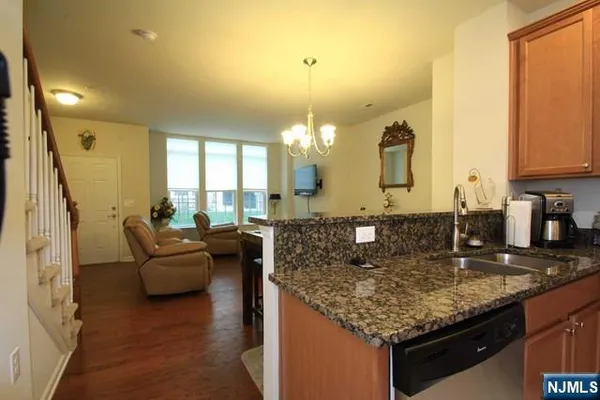 a kitchen with granite countertop lots of counter top space