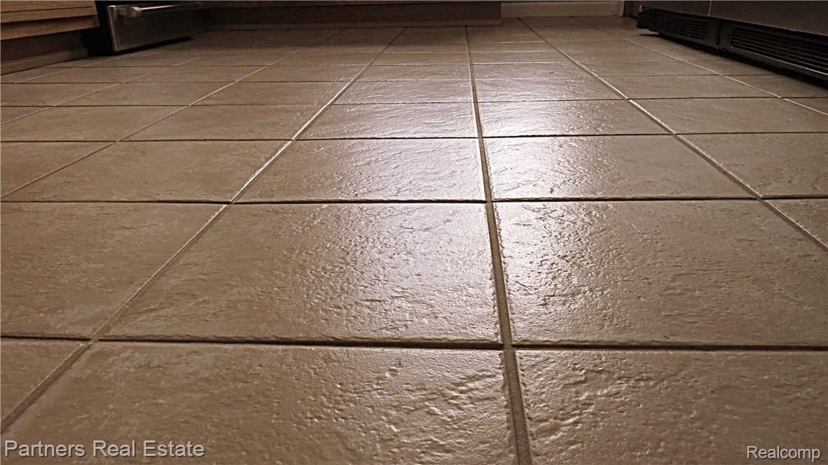 4524 Pinckney Road Howell, MI 48843 - Photo 12 of 58 10a.Kitchen flooring at 4524 Pinckney Rd House on the Hill