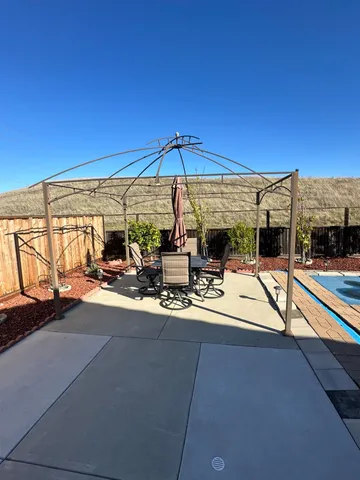 a balcony view with wooden floor and stairs