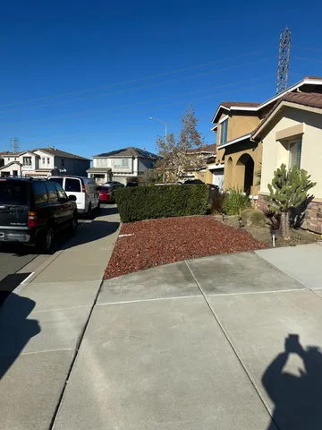a car parked in front of a house
