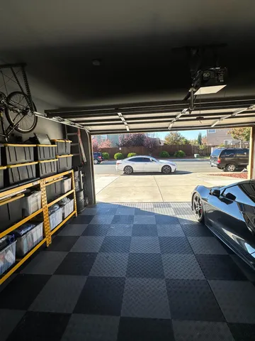 a view of the house with potted plants